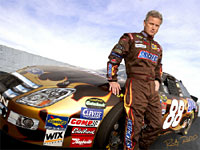 ricky rudd next to his car